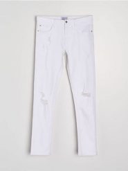 Jeansy slim fit z przetarciami - biały. Białe jeansy męskie Sinsay. Za 69.99 zł.