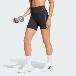 Krótkie legginsy Optime Workout 3-Stripes. Czarne legginsy damskie Adidas, bez wzorów, z lycry, sportowe, z podwyższonym stanem, na fitness i siłownię. Za 199.00 zł.
