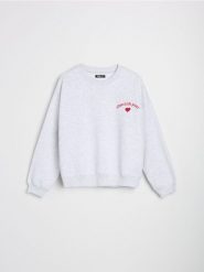 Bluza z napisem - szary. Szare bluzy damskie Sinsay, l, bez wzorów, bez kaptura. W wyprzedaży za 19.99 zł.