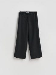 Spodnie wide leg - czarny. Czarne spodnie materiałowe damskie Reserved, l, bez wzorów, z tkaniny. Za 149.99 zł.
