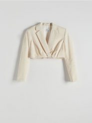 Krótka marynarka z domieszką lnu - beżowy. Brązowe żakiety damskie Reserved, l, bez wzorów, z bawełny. W wyprzedaży za 69.99 zł.