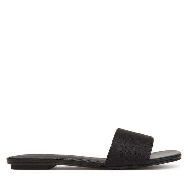 Klapki Calvin Klein. Czarne klapki damskie Calvin Klein, bez wzorów, bez obcasa. Za 209.99 zł.