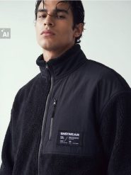 Rozpinana bluza sherpa ze stójką i kontrastowym panelem - czarny. Czarne bluzy męskie Sinsay, l, bez wzorów, bez kaptura. Za 79.99 zł.