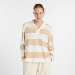 Koszulka damska New Balance WT53522DLA – beżowa. Brązowe t-shirty damskie New Balance, xs, bez wzorów, z bawełny, klasyczne, bez kołnierzyka. Za 329.99 zł.