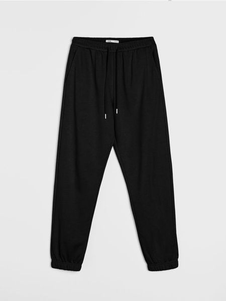 Dresowe spodnie jogger terry - czarny. Czarne spodnie dresowe damskie Sinsay, l, bez wzorów, z dresówki. Za 29.99 zł.