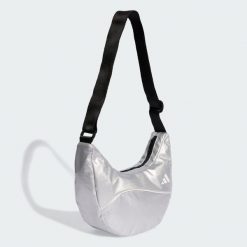 Torba na ramię adidas Glow. Białe torby na ramię damskie Adidas, bez wzorów, sportowe, bez dodatków. Za 89.95 zł.