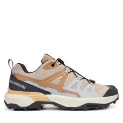 Trekkingi Salomon. Brązowe obuwie sportowe damskie Salomon, bez wzorów, trekkingowe. Za 477.99 zł.
