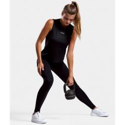 Tank-top Elegancja - Czarny. Czarne koszulki sportowe damskie NORDICDOTS, xs, bez wzorów, z elastanu, bez kołnierzyka, bez ramiączek. Za 185.00 zł.