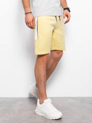 Szorty męskie dresowe z lampasem - żółte V1. Żółte szorty męskie Ombre Clothing, m, bez wzorów, z bawełny. W wyprzedaży za 39.99 zł.
