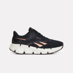 Damskie buty do biegania Reebok ZIG DYNAMICA 6 100263921 czarne. Czarne obuwie sportowe damskie Reebok, bez wzorów, do biegania. Za 329.00 zł.