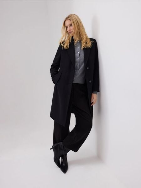 Płaszcz z dodatkiem wełny - czarny. Czarne płaszcze damskie Reserved, l, bez wzorów, z tkaniny, bez kaptura. Za 259.99 zł.