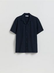 Strukturalna koszula regular fit - granatowy. Niebieskie koszule męskie Reserved, l, bez wzorów, z bawełny, bez kołnierzyka, bez ramiączek. Za 119.99 zł.