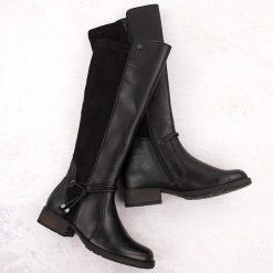 Skórzane kozaki damskie oficerki ocieplane czarne Rieker Z9564-00. Czarne kozaki damskie Rieker, ze skóry, bez obcasa. Za 499.00 zł.