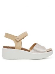 ECCO Sandały Flowt Wedge 27231360704 Złoty. Żółte sandały damskie ecco, bez wzorów, ze skóry, bez obcasa, na koturnie, bez zapięcia. Za 419.99 zł.