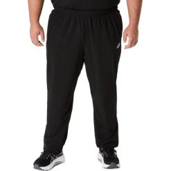 Spodnie dresowe Asics Core woven. Czarne spodnie sportowe męskie Asics, l, bez wzorów, z dresówki, do biegania. Za 284.05 zł.