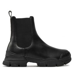 Sztyblety LOVE MOSCHINO. Czarne botki damskie Love Moschino, bez obcasa, na płaskiej podeszwie, bez zapięcia. Za 529.99 zł.