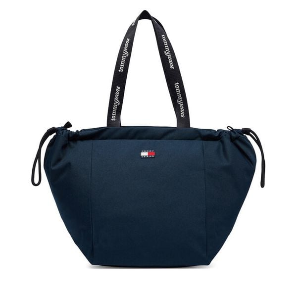 Torebka Tommy Jeans. Niebieskie torebki do ręki damskie Tommy Jeans, bez wzorów, z jeansu, klasyczne, bez dodatków. Za 236.99 zł.