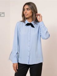 Wiskozowa koszula z wiązaniem - błękitny. Niebieskie koszule damskie Sinsay, l, bez wzorów, z wiskozy, bez kołnierzyka, bez ramiączek. Za 39.99 zł.