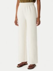 Armani Exchange Spodnie dresowe XW002840 AF21298 U1003 Kremowy Regular Fit. Białe spodnie dresowe damskie Armani Exchange, s, bez wzorów, z bawełny. Za 599.99 zł.