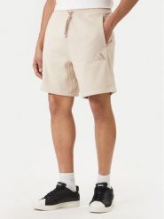 Adidas Szorty sportowe ALL SZN KC3164 Beżowy Regular Fit. Brązowe krótkie spodenki sportowe męskie Adidas, m, bez wzorów, z bawełny. Za 179.99 zł.