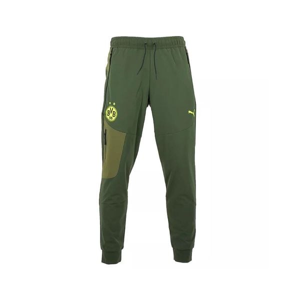 Spodnie dresowe Borussia Dortmund Tech Woven. Zielone eleganckie spodnie męskie Puma, s, bez wzorów, z dresówki. Za 249.75 zł.