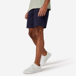 Spodenki fitness męskie Domyos 500 Essentials. Niebieskie krótkie spodenki sportowe męskie DOMYOS, l, bez wzorów, z bawełny, na fitness i siłownię. Za 49.99 zł.