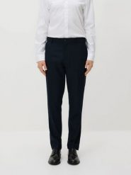 Spodnie garniturowe slim fit - granatowy. Niebieskie eleganckie spodnie męskie Reserved, bez wzorów, z elastanu. Za 169.99 zł.