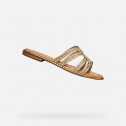 Sandały GEOX D SOZY PLUS Złoty. Żółte sandały damskie Geox, bez wzorów, ze skóry, bez obcasa, bez zapięcia. Za 350.99 zł.
