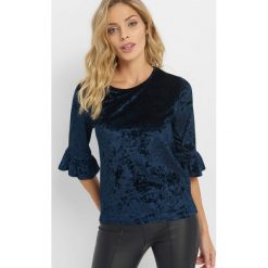 Welurowa koszulka z falbanką. T-shirty damskie marki Orsay. Za 49.99 zł.