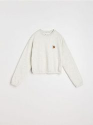 Bluza crewneck z naszywką - szary. Szare bluzy damskie Sinsay, l, z aplikacjami, bez kaptura. Za 39.99 zł.