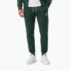 Spodnie męskie Pitbull Nexus Track. Zielone spodnie sportowe męskie PITBULL, l, bez wzorów, na fitness i siłownię. Za 229.99 zł.