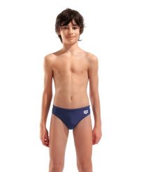 Kąpielówki Chłopięce Arena Tales Swim Briefs. Niebieskie kąpielówki dla chłopców Arena, bez wzorów, z materiału. Za 79.99 zł.