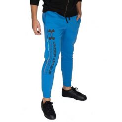 Spodnie dresowe męskie Under Armour. Niebieskie spodnie sportowe męskie Under Armour, m, bez wzorów, z dresówki, na fitness i siłownię. Za 156.60 zł.