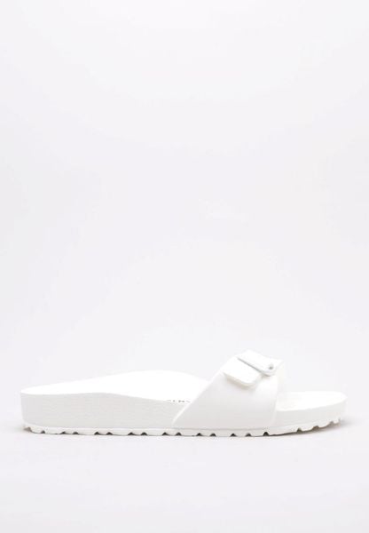 Klapki damskie Birkenstock Eva Madrid. Białe klapki damskie Birkenstock, bez wzorów, z materiału, bez obcasa. Za 278.00 zł.