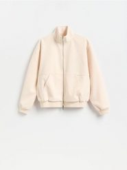 Sztruksowa bluza ze stójką - kremowy. Białe bluzy męskie Reserved, l, bez wzorów, z dzianiny, bez kaptura. Za 149.99 zł.