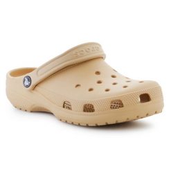 Klapki Crocs Classic 10001-209 brązowe. Brązowe klapki damskie bez wzorów, casualowe, bez obcasa. Za 345.55 zł.