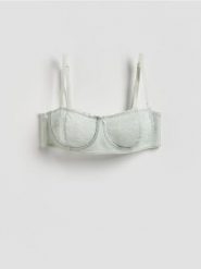 Miękki biustonosz z fiszbinami - jasnozielony. Zielone biustonosze Reserved, bez wzorów, z koronki. Za 69.99 zł.