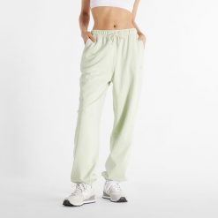 Spodnie damskie New Balance WP41513NUM – miętowe. Zielone spodnie sportowe damskie New Balance, m, bez wzorów, z bawełny. Za 169.99 zł.
