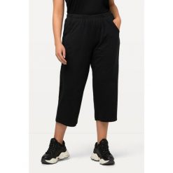 Damskie bis 58+| Spodnie dresowe 7/8 | Spodnie dresowe z elastyczną. Czarne spodnie sportowe damskie Ulla Popken, plus size, bez wzorów, z bawełny. W wyprzedaży za 100.99 zł.