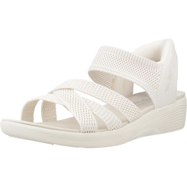 Sandały SKECHERS SLIP-INS ARYA Biały. Białe sandały damskie Skechers, bez wzorów, z materiału, bez obcasa, bez zapięcia. Za 490.00 zł.