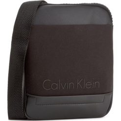 Saszetka CALVIN KLEIN - Caillou Mini Flat Cr K50K502829 001. Czarne saszetki męskie Calvin Klein, z materiału, młodzieżowe. W wyprzedaży za 209.00 zł.