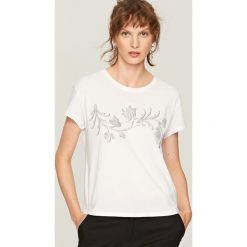 T-shirt z nadrukiem - Biały. Białe t-shirty damskie Reserved, z nadrukiem. Za 39.99 zł.