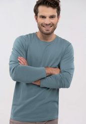 Niebieski longsleeve L-HALS. Niebieskie bluzki z długim rękawem męskie Volcano, l, z aplikacjami, z bawełny, klasyczne, bez kołnierzyka. Za 79.99 zł.