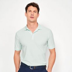 Koszulka polo do golfa z krótkim rękawem męska Inesis WW500. Niebieskie koszulki polo męskie INESIS, l, bez wzorów, z materiału, bez kołnierzyka, bez ramiączek, na golfa. Za 79.99 zł.