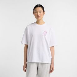 Koszulka damska New Balance WT51940WT – biała. Białe t-shirty damskie New Balance, xs, bez wzorów, z bawełny, eleganckie, bez kołnierzyka. Za 129.99 zł.