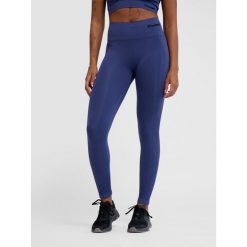 Damskie legginsy bezszwowe z wysoką talią Hummel TIF. Niebieskie legginsy sportowe damskie Hummel, bez wzorów, na fitness i siłownię. Za 143.00 zł.