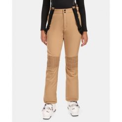 Damskie spodnie narciarskie typu softshell Kilpi DIONE-W. Brązowe spodnie snowboardowe damskie Kilpi, na zimę, bez wzorów, z softshellu, sportowe, narciarskie. Za 680.25 zł.