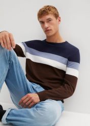 Sweter z dzianiny o splocie drobnych oczek, we wzór colourblocking, z bawełny. Niebieskie swetry przez głowę męskie bonprix, l, bez wzorów, z bawełny, bez kołnierzyka. Za 112.99 zł.
