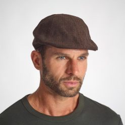 Kaszkiet outdoor Solognac. Brązowe czapki i kapelusze męskie SOLOGNAC, bez wzorów, z bawełny, sportowe. Za 39.99 zł.