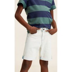 Mango Kids - Szorty dziecięce John 104-164 cm. Niebieskie szorty dla chłopców Mango Kids, z aplikacjami, z bawełny, casualowe. W wyprzedaży za 29.90 zł.